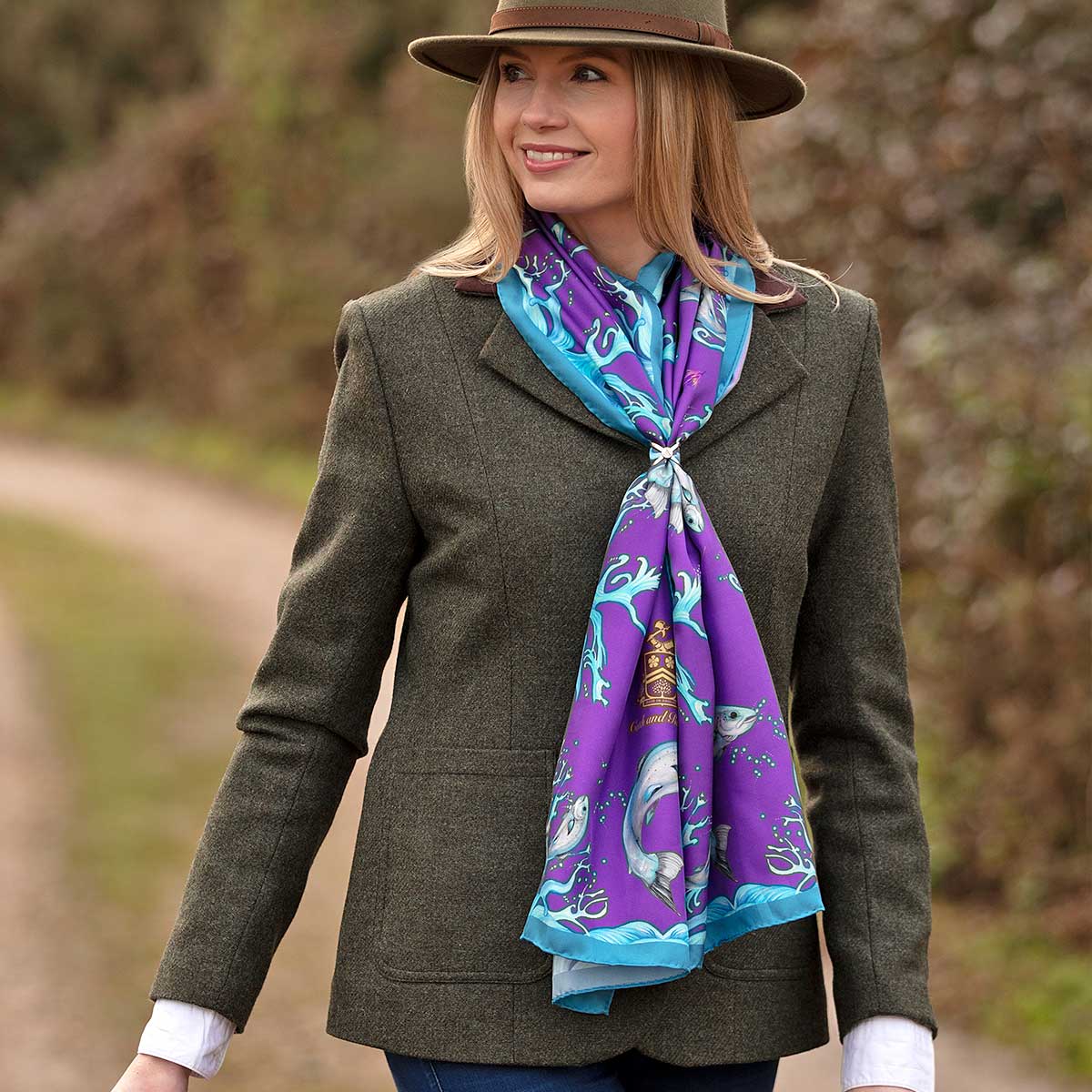 The Tied Drape with Scarf Ring, the best way to tie a classic or rectangluar silk scarf.